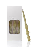 Maegen twisted taper candles with packaging on a white background